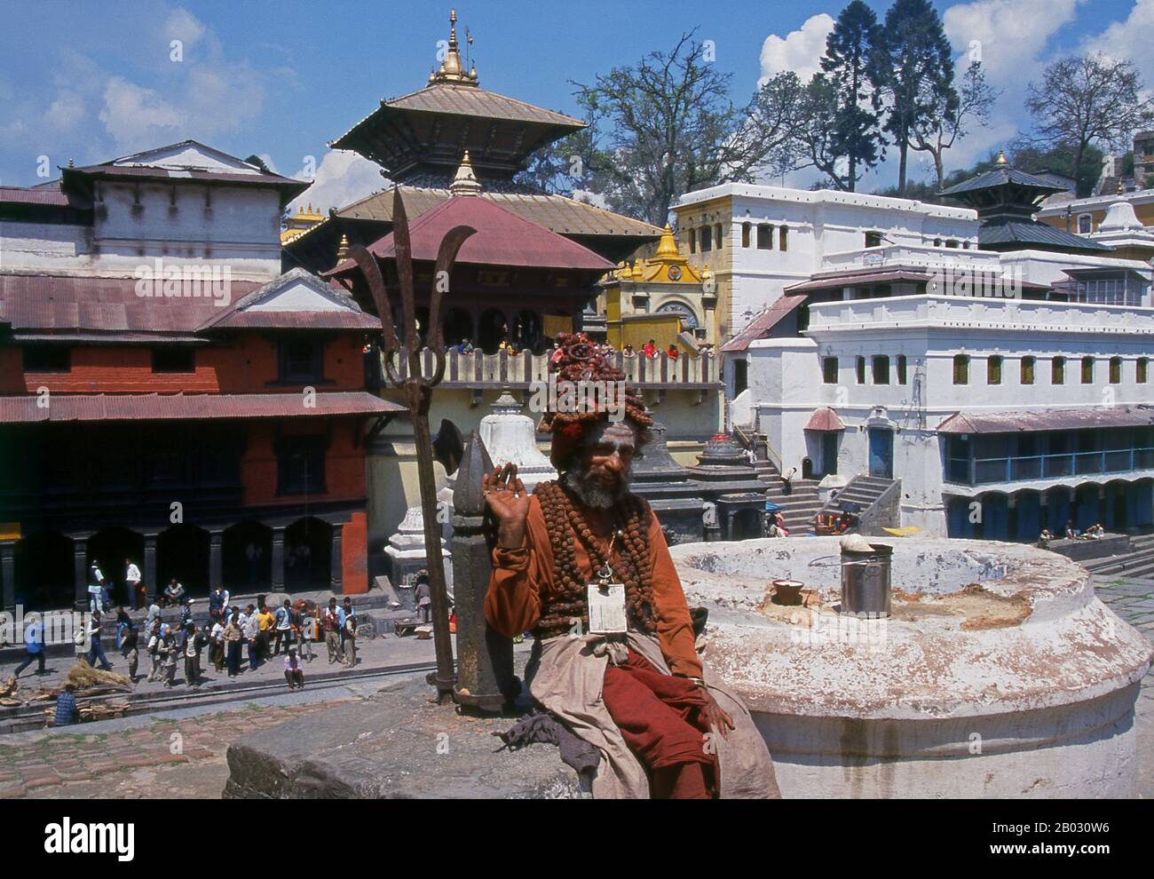 The most revered Hindu site in Nepal is the extensive Pashupatinath Temple complex, five kilometres east of central Kathmandu. The focus of devotion here is a large silver Shivalingam with four faces of Shiva carved on its sides, making it a 'Chaturmukhi-Linga', or four-faced Shivalingam. Pashupati is one of Shiva’s 1,008 names, his manifestation as 'Lord of all Beasts' (pashu means 'beasts', pati means 'lord'); he is considered the guardian deity of Nepal.   The main temple building around the Shivalingam was built under King Birpalendra Malla in 1696, however the temple is said to have alrea Stock Photo