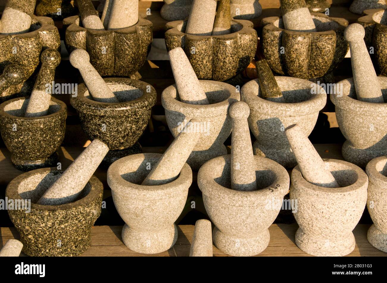 The fishing village of Ang Sila (see pxx) in Chonburi Province is renowned throughout the Eastern Seaboard and Bangkok for producing finely-crafted household implements such as pestles and mortars, as well as figurines of people and animals, from locally-sourced granite. Stock Photo