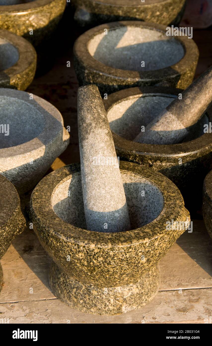 The fishing village of Ang Sila (see pxx) in Chonburi Province is renowned throughout the Eastern Seaboard and Bangkok for producing finely-crafted household implements such as pestles and mortars, as well as figurines of people and animals, from locally-sourced granite. Stock Photo
