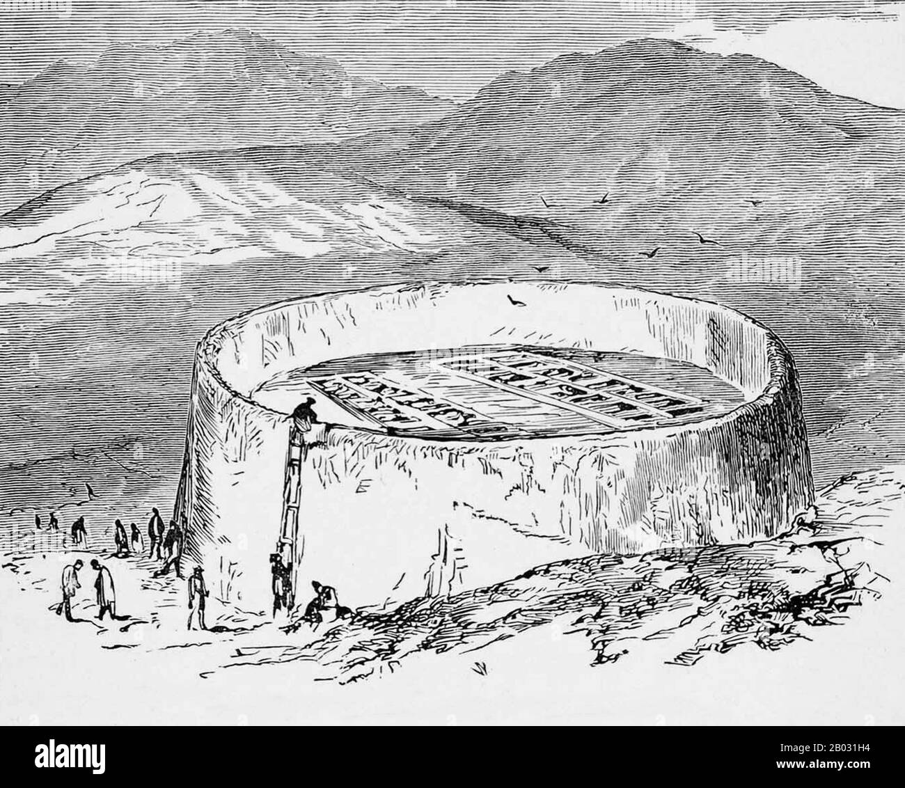 A Tower of Silence or Dakhma is a circular, raised structure used by Zoroastrians for exposure of the dead. There is no standard technical name for such a construction. The common dakhma or dokhma (from Middle Persian dakhmag) originally denoted any place for the dead. Similarly, in the medieval texts of Zoroastrian tradition, the word astodan appears, but today denotes an ossuary.  In the Iranian provinces of Yazd and Kerman, the technical term is deme or dema. In India, the term doongerwadi came into use after a tower was constructed on a hill of that name. The word dagdah appears in the tex Stock Photo