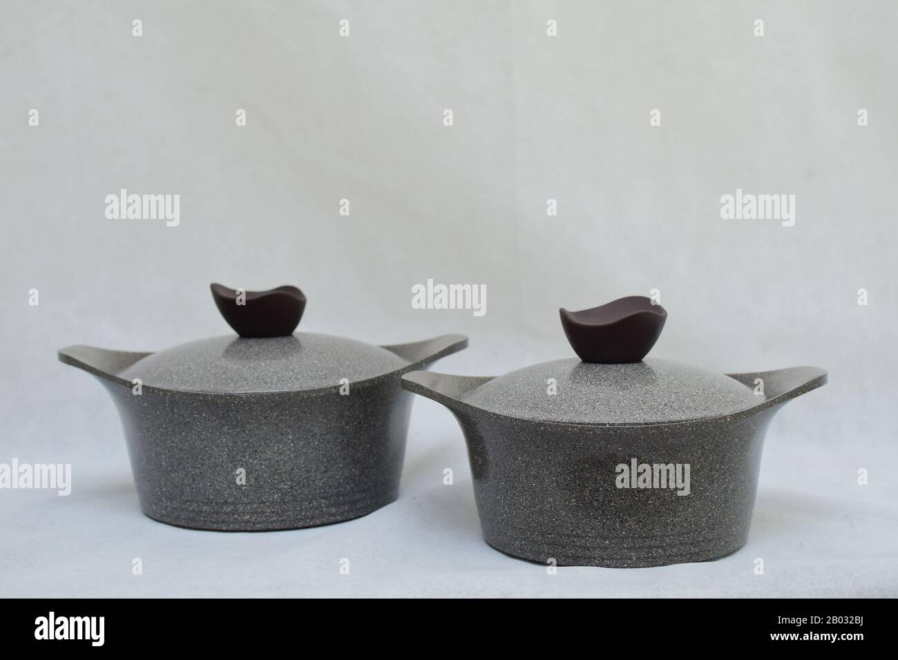Mock up / design set of elegant and traditional cooking pots and goblet ...