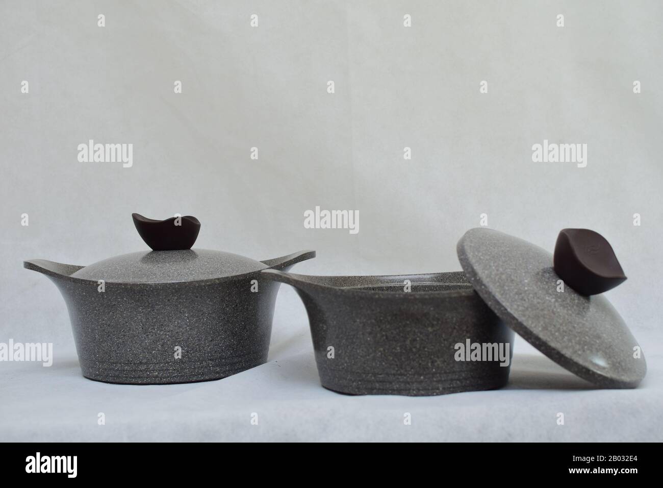 Mock up / design set of elegant and traditional cooking pots and goblet ...