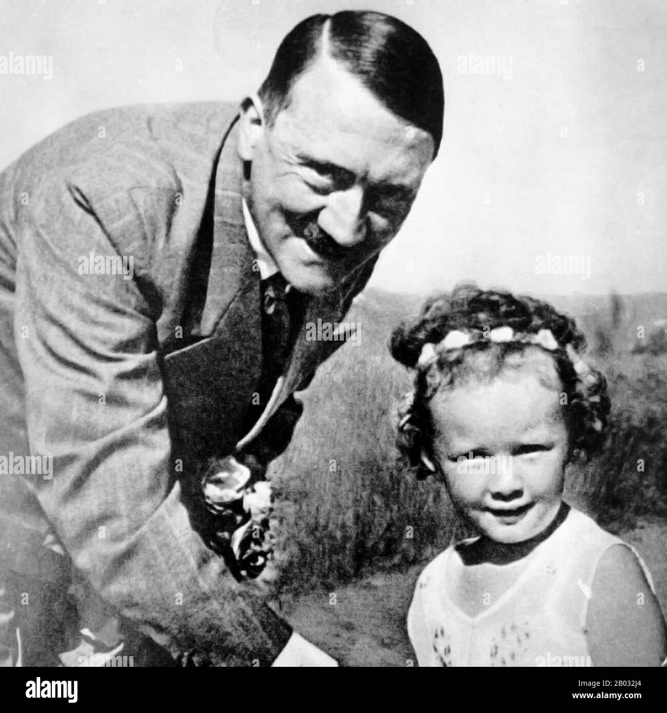 Adolf Hitler (20 April 1889 – 30 April 1945) was a German politician of Austrian origin who was the leader of the Nazi Party (NSDAP), Chancellor of Germany from 1933 to 1945, and Führer ('leader') of Nazi Germany from 1934 to 1945.  As dictator of Nazi Germany he initiated World War II in Europe and was a central figure of the Holocaust. Stock Photo