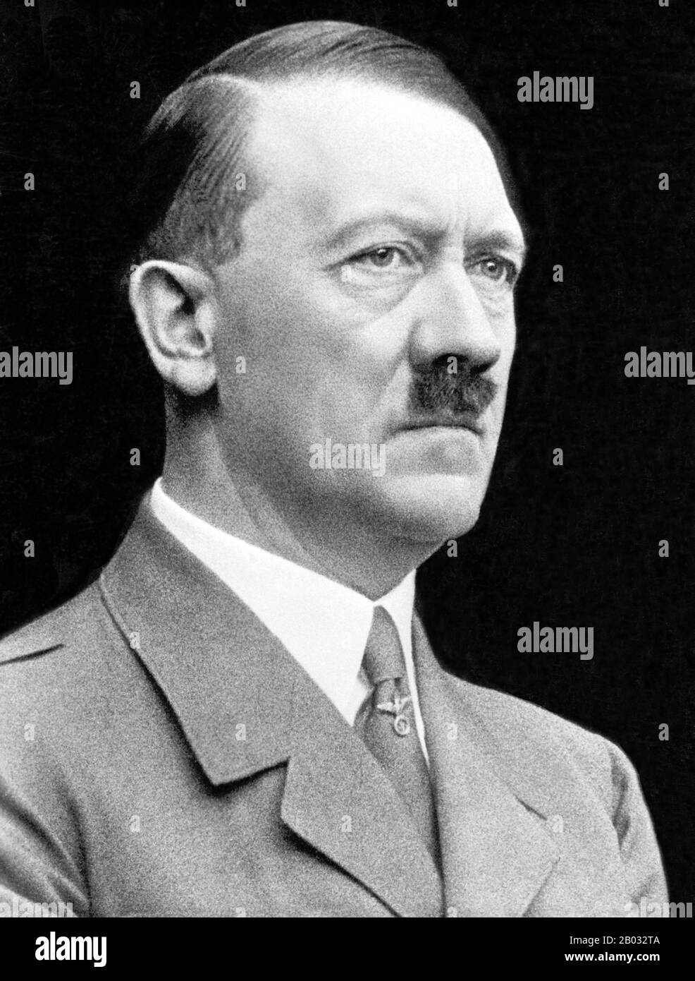Adolf Hitler (20 April 1889 – 30 April 1945) was a German politician of Austrian origin who was the leader of the Nazi Party (NSDAP), Chancellor of Germany from 1933 to 1945, and Führer ('leader') of Nazi Germany from 1934 to 1945.  As dictator of Nazi Germany he initiated World War II in Europe and was a central figure of the Holocaust. Stock Photo