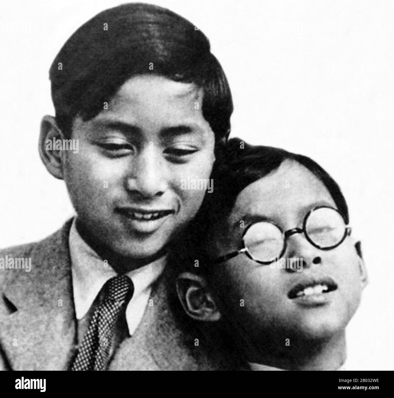 Ananda Mahidol (20 September 1925–9 June 1946) was the eighth monarch of Thailand under the House of Chakri. He was recognized as king by the National Assembly in March 1935. He was a nine-year-old boy living in Switzerland at this time. He returned to Thailand in December 1945.  On 9 June 1946, the King was found dead in his bedroom in the Boromphiman Throne Hall, (a modern residential palace located within the Grand Palace), only four days before he was scheduled to return to Switzerland to finish his doctoral degree in Law at the University of Lausanne. His brother Bhumibol Adulyadej succee Stock Photo