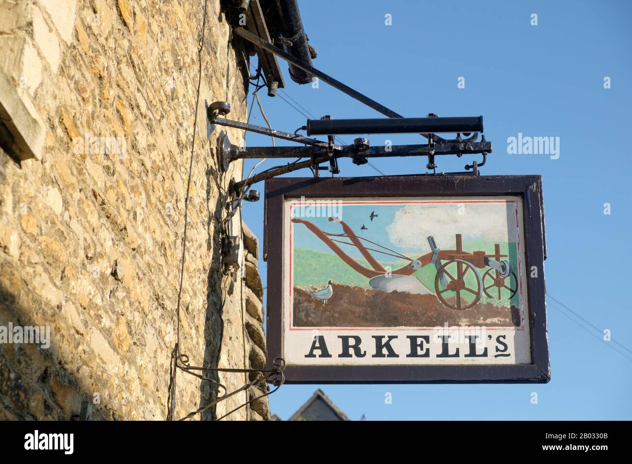 Fairford is a small Gloucestershire town.  Set in the Central Cotswolds it is a few miles East of Cirencester. The Plough an Arkells Pub Stock Photo