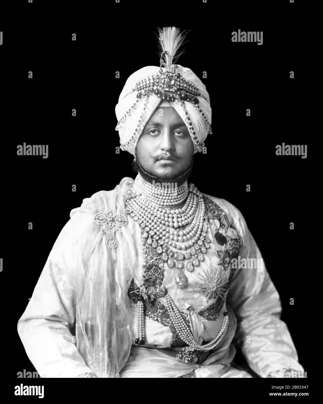 Bhupinder Singh was born at the Moti Bagh Palace, Patiala and educated at Aitchison College. At age 9, he succeeded as maharaja of Patiala state upon the death of his father, Maharaja Rajinder Singh, on 9 November 1900. A Council of Regency ruled in his name until he took partial powers shortly before his 18th birthday on 1 October 1909 and was invested with full powers by the Viceroy of India, the 4th Earl of Minto, on 3 November 1910.  He served on the General Staff in France, Belgium, Italy and Palestine in the First World War as an Honorary Lieutenant-Colonel, and was promoted Honorary Maj Stock Photo