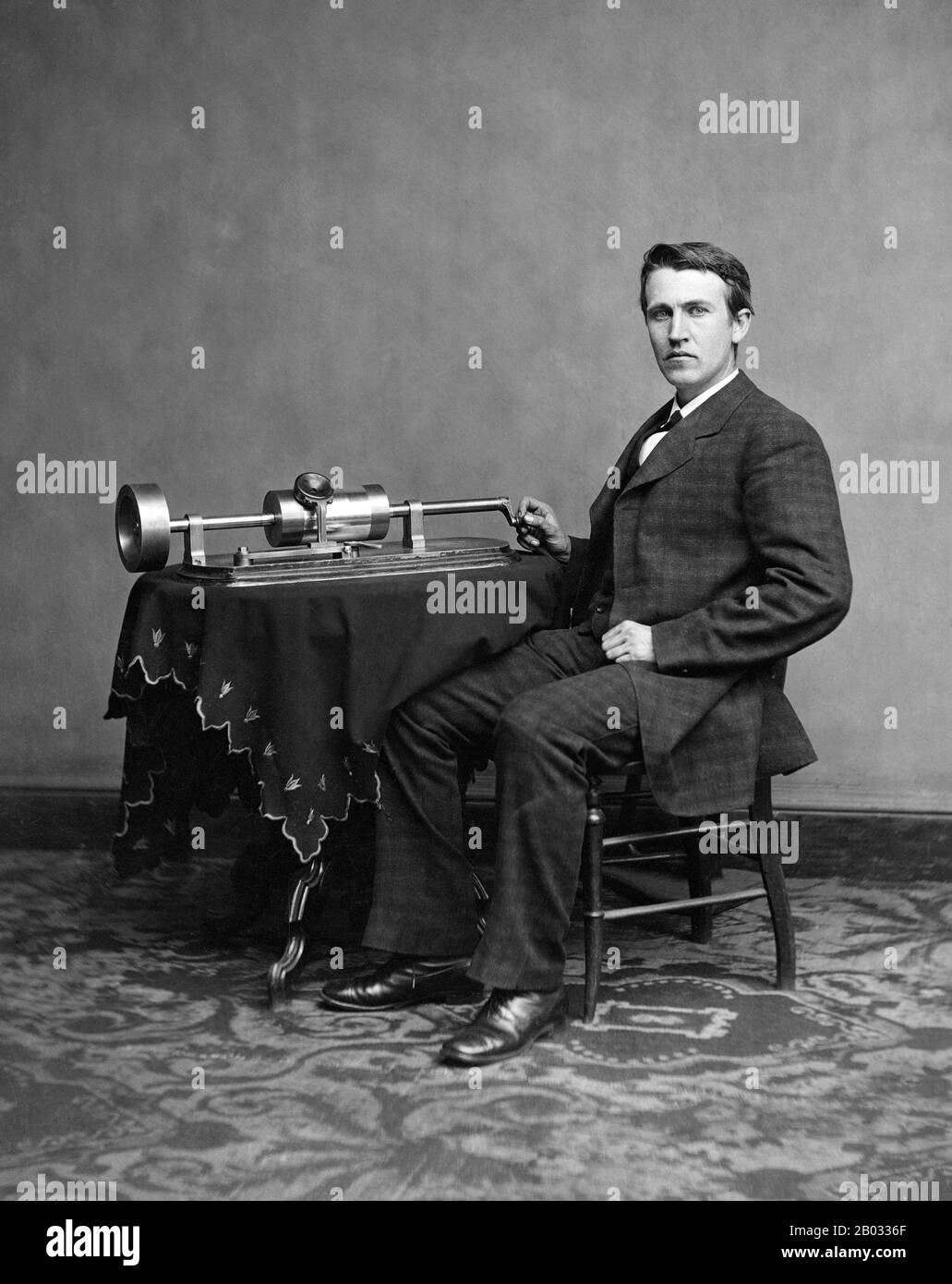 Thomas Alva Edison (February 11, 1847 – October 18, 1931) was an American inventor and businessman. He developed many devices that greatly influenced life around the world, including the phonograph, the motion picture camera, and the long-lasting, practical electric light bulb.  Edison was a prolific inventor, holding 1,093 US patents in his name, as well as many patents in the United Kingdom, France, and Germany. More significant than the number of Edison's patents was the widespread impact of his inventions: electric light and power utilities, sound recording, and motion pictures all establi Stock Photo