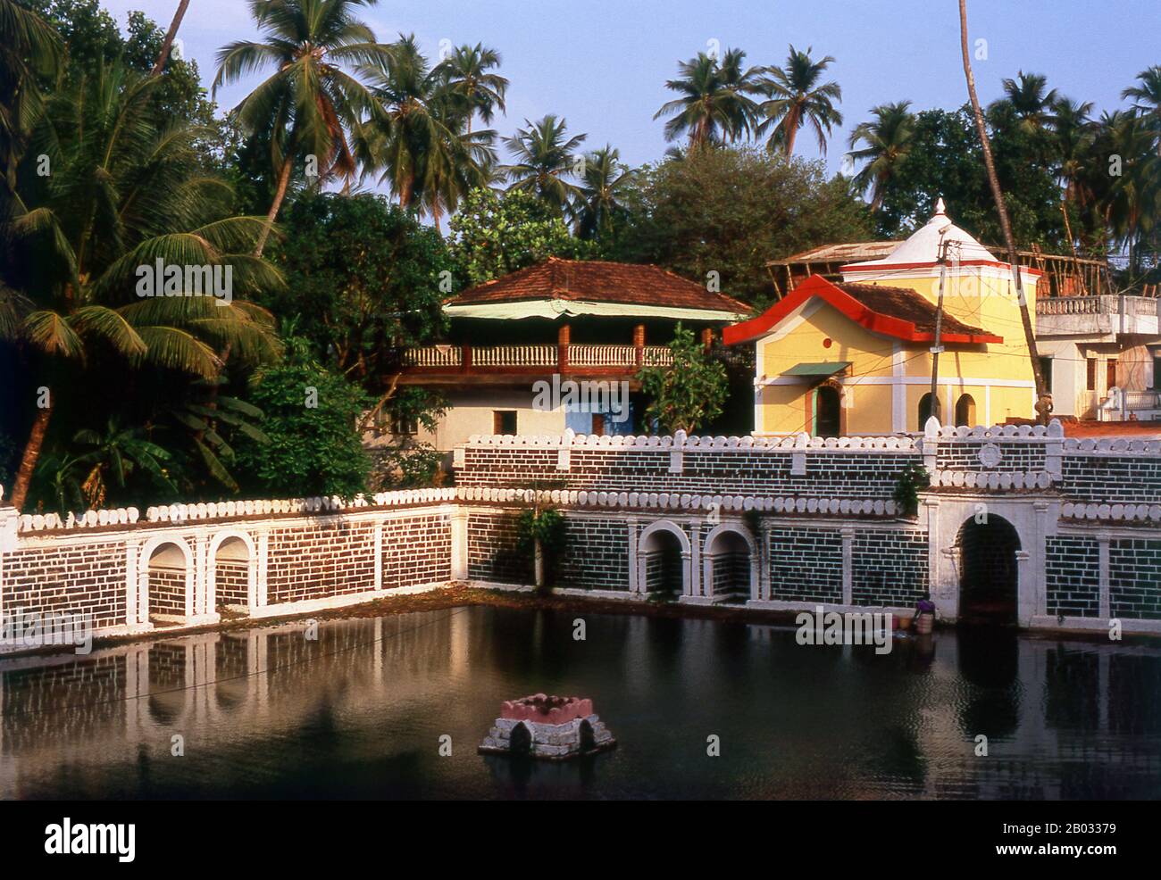 The Shri Mangesh Temple has its origins in Kushasthali Cortalim, a village in Saxty (Salcette) which fell to the invading Portuguese in 1543. In the year 1560, when the Portuguese started Christian conversions in Salcete, the Saraswats of Vatsa Gotra moved the Mangesh Linga from the original site on the banks of the Aghanashini (Zuari) River to its present location, which was then ruled by the Hindu kings of Sonde of Antruz Mahal (Ponda) and thought to be more secure.  The main temple is dedicated to Bhagavan Manguesh, an incarnation of Shiva. Stock Photo