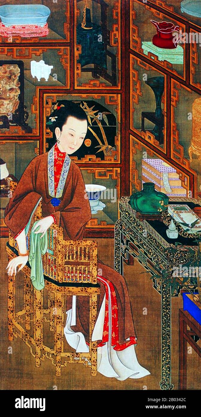 China: 'Lost in Thought while Viewing Antiques', from the Yongzheng shier meiren tu or 'Twelve Beauties of Prince Yong', Qing Dynasty court painting, early 18th century. When Yongzheng was still a prince, he commissioned a beautiful set of paintings for the purpose of decorating a screen in the Deep Willows Reading Hall, a study within his private quarters at the Summer Palace. An imperial garden to the northwest of Beijing, the Summer Palace was presented to the young prince in 1709 by his father the Kangxi emperor (r. 1662-1722). Stock Photo