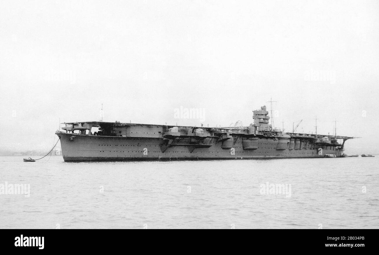 Hiryu ('Flying Dragon') was an aircraft carrier built for the Imperial Japanese Navy (IJN) during the 1930s. The only ship of her class, she was built to a modified Soryu design. Her aircraft supported the Japanese invasion of French Indochina in mid-1940. During the first month of the Pacific War, she took part in the attack on Pearl Harbor and the Battle of Wake Island. The ship supported the conquest of the Dutch East Indies in January 1942. The following month, her aircraft bombed Darwin, Australia, and continued to assist in the Dutch East Indies campaign. In April, Hiryu's aircraft helpe Stock Photo