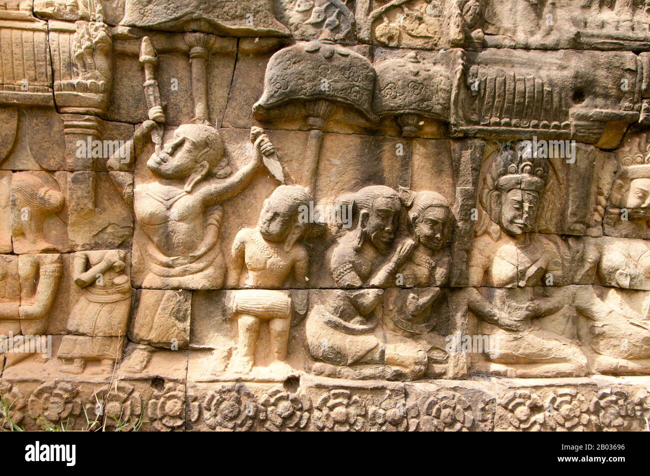 Cambodia Basrelief of a sword swallower on the northern outer terrace