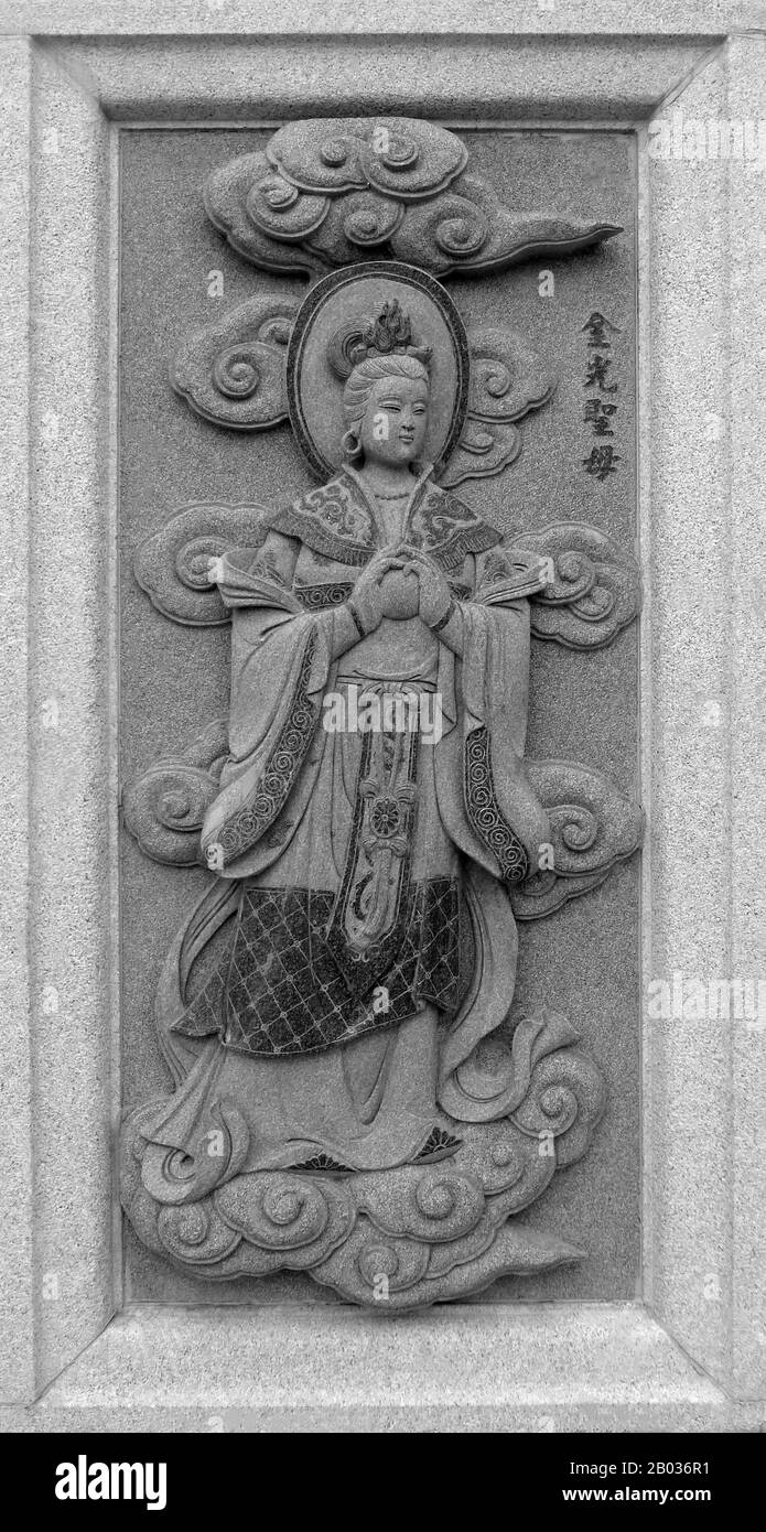 China: Carving of Jinguang Shengmu, depicting her role in the 16th ...