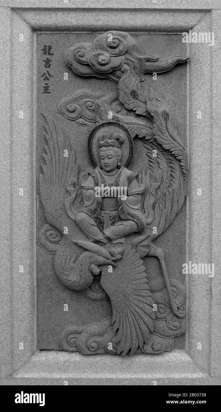 China: Carving of Princess Long Ji (Longji), depicting her role in the 16th Century Ming Dynasty novel Fengshen Yanyi ('Investiture of the Gods'). From Ping Sien Si Temple, Pasir Panjang Laut. Photo by Anandajoti (CC BY 2.0). Princess Long Ji, sometimes written as Longji, was a character from the classic Ming Dynasty novel 'Fengshen Yanyi'. Princess Longji was the daughter of the exiled Jade Emperor and the Queen Mother of the West, Xiwang Mu. She was a celestial being who was able to control the water and rain, and was armed with twin dragon swords. Stock Photo
