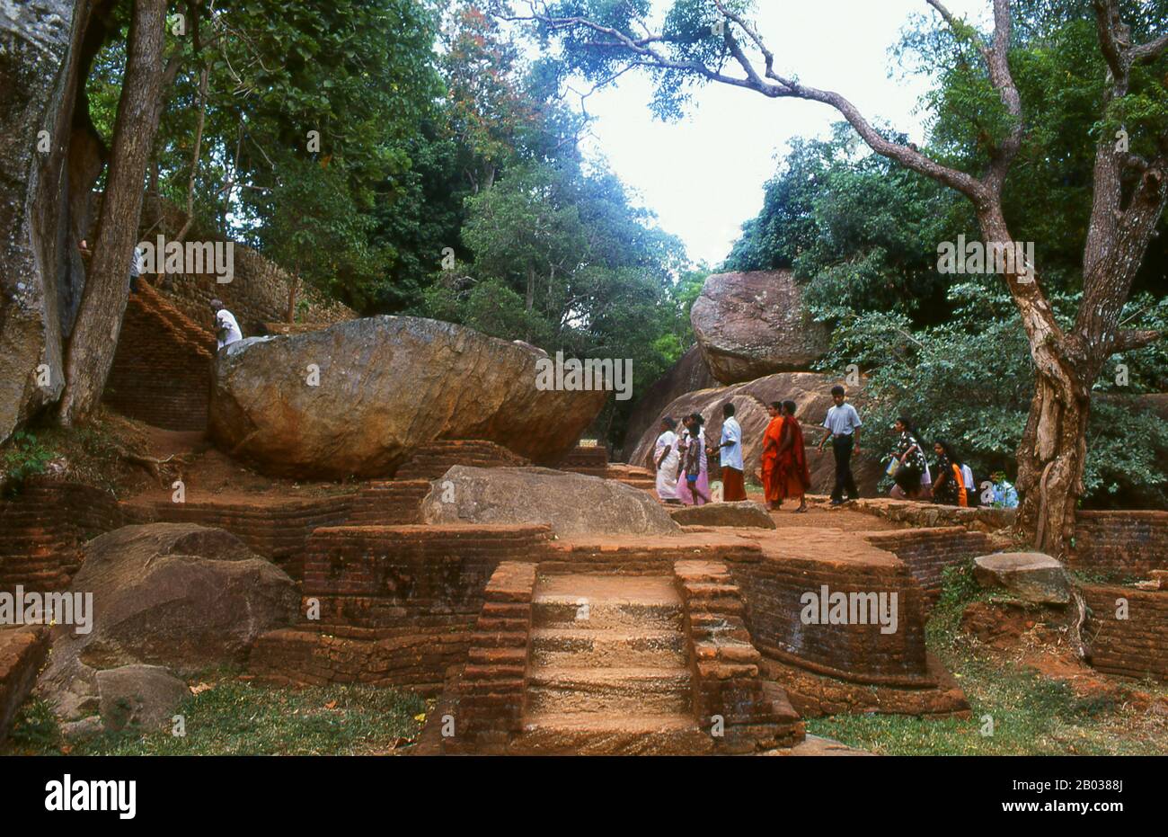 Sigiriya (Lion's rock) is an ancient rock fortress and palace ruin situated in the central Matale District of Sri Lanka, surrounded by the remains of an extensive network of gardens, reservoirs, and other structures. Sigiriya was built during the reign of King Kasyapa I (CE 477 – 495) and after his death it was used as a Buddhist monastery until the 14th century. Stock Photo