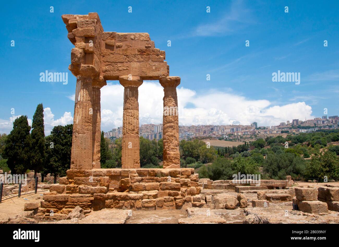 Agrigento was founded on a plateau overlooking the sea, with two nearby rivers, the Hypsas and the Akragas, and a ridge to the north offering a degree of natural fortification. Its establishment took place around 582–580 BCE and is attributed to Greek colonists from Gela, who named it 'Akragas'.  Akragas grew rapidly, becoming one of the richest and most famous of the Greek colonies of Magna Graecia (Greater Greece). It came to prominence under the 6th-century tyrants Phalaris and Theron, and became a democracy after the overthrow of Theron's son Thrasydaeus.  Although the city remained neutra Stock Photo