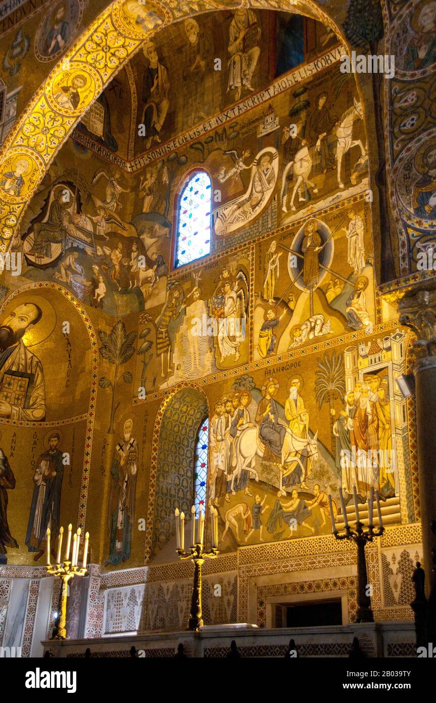 The Palatine Chapel was the royal chapel of the Norman kings of Sicily. It was commissioned by Roger II of Sicily (1095 - 1154) in 1132 to be built upon an older chapel (now the crypt) constructed around 1080. It took eight years to build, receiving a royal charter the same year, with the mosaics being only partially finished by 1143. Stock Photo