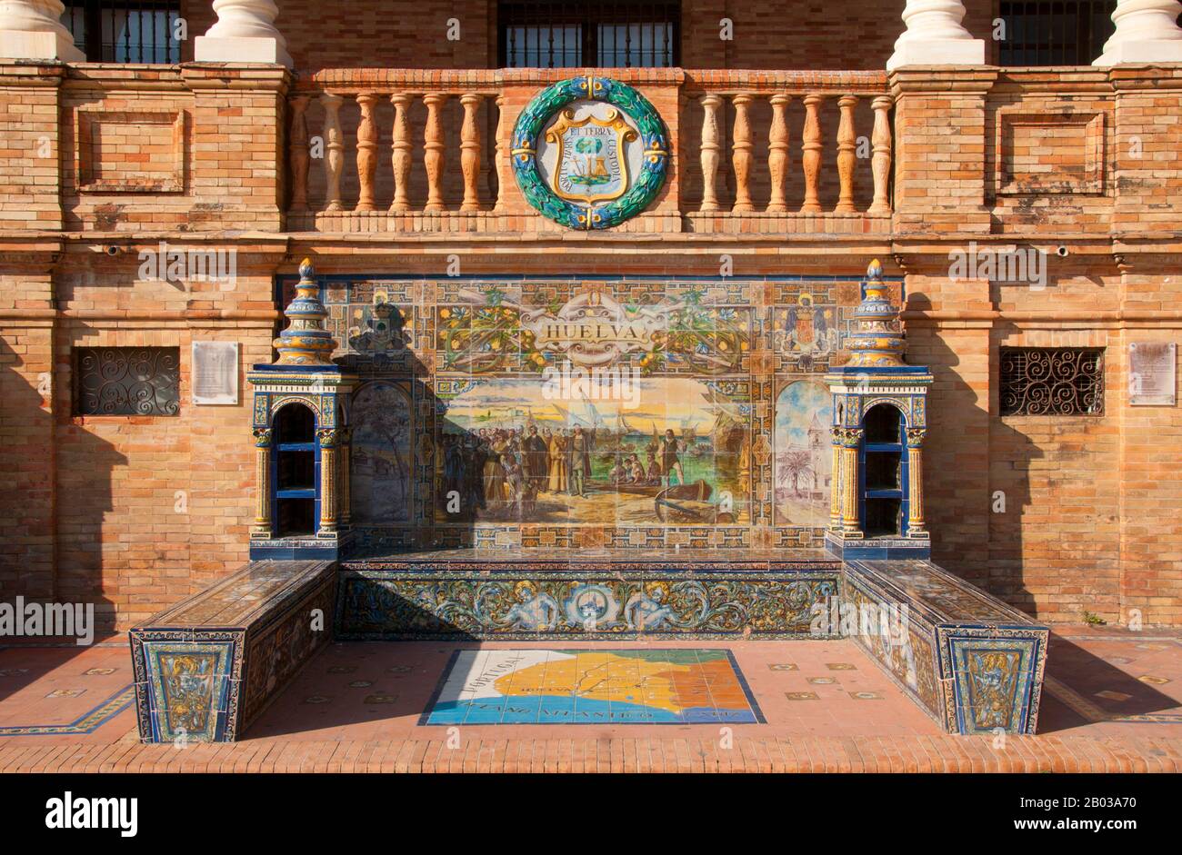 Huelva is a province of southern Spain, in the western part of the autonomous community of Andalusia.  The Plaza de España is a plaza in the Parque de María Luisa (Maria Luisa Park), in Seville, Spain, built in 1928 for the Ibero-American Exposition of 1929. It is a landmark example of the Regionalism Architecture, mixing elements of the Renaissance Revival and Moorish Revival (Neo-Mudéjar) styles of Spanish architecture. Stock Photo