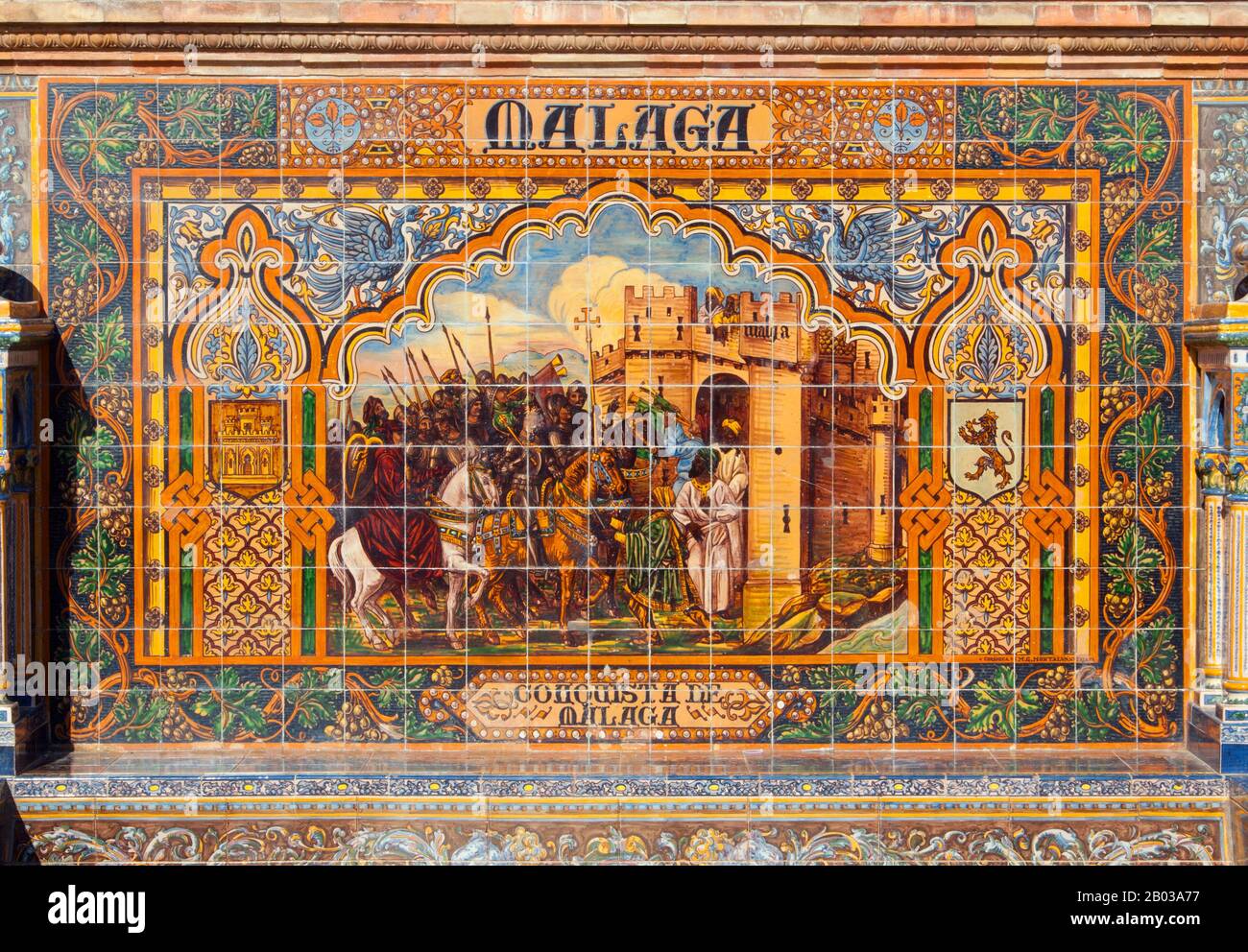 The Province of Málaga is located on the southern mediterranean coast of Spain, in Andalusia.  The Plaza de España is a plaza in the Parque de María Luisa (Maria Luisa Park), in Seville, Spain, built in 1928 for the Ibero-American Exposition of 1929. It is a landmark example of the Regionalism Architecture, mixing elements of the Renaissance Revival and Moorish Revival (Neo-Mudéjar) styles of Spanish architecture. Stock Photo