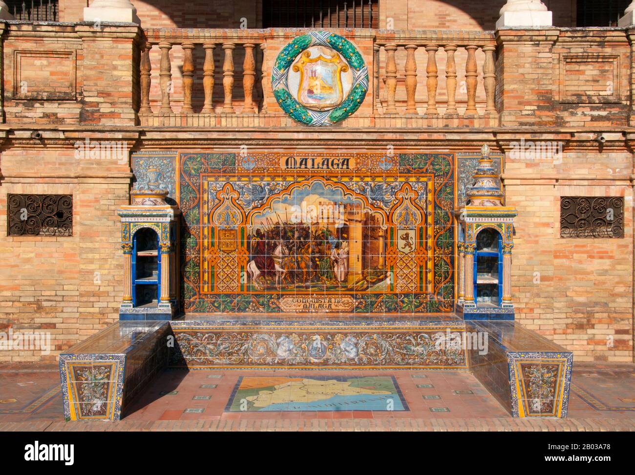 The Province of Málaga is located on the southern mediterranean coast of Spain, in Andalusia.  The Plaza de España is a plaza in the Parque de María Luisa (Maria Luisa Park), in Seville, Spain, built in 1928 for the Ibero-American Exposition of 1929. It is a landmark example of the Regionalism Architecture, mixing elements of the Renaissance Revival and Moorish Revival (Neo-Mudéjar) styles of Spanish architecture. Stock Photo
