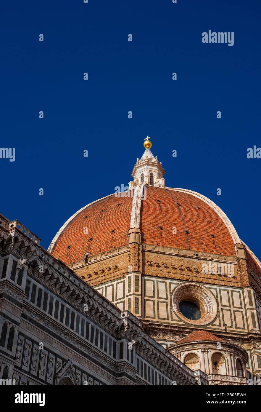 St Mary of the Flower iconic dome in Florence seen from below, built by italian architect Brunelleschi in the 15th century and symbol of Renaissance i Stock Photo