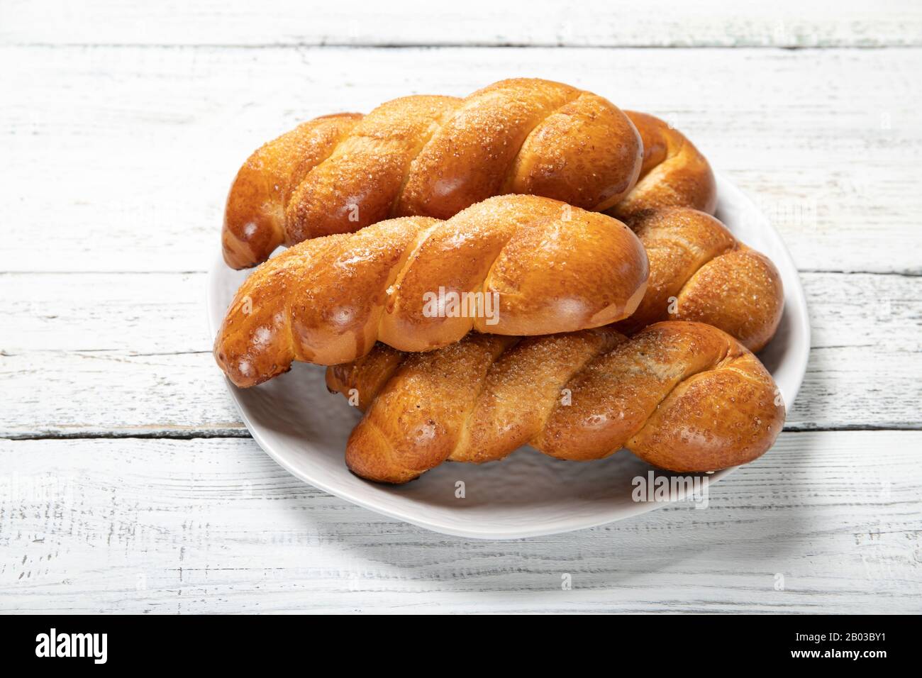 Delicious pastries.Tasty buns.Delicious Pigtail Buns Stock Photo