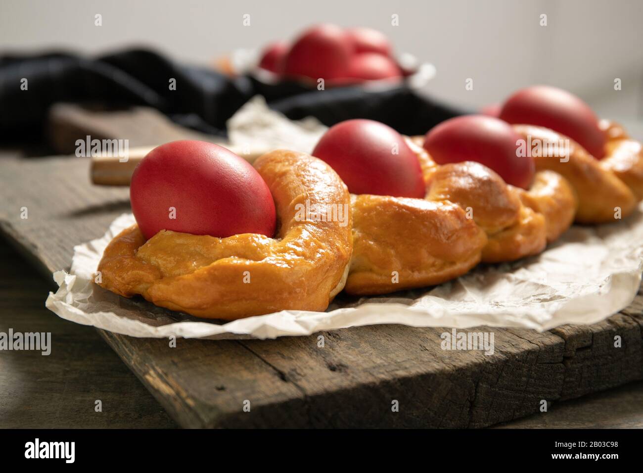 Tasty easter bread. East.Close-uper bread and red eggs. Italian easter bread Stock Photo