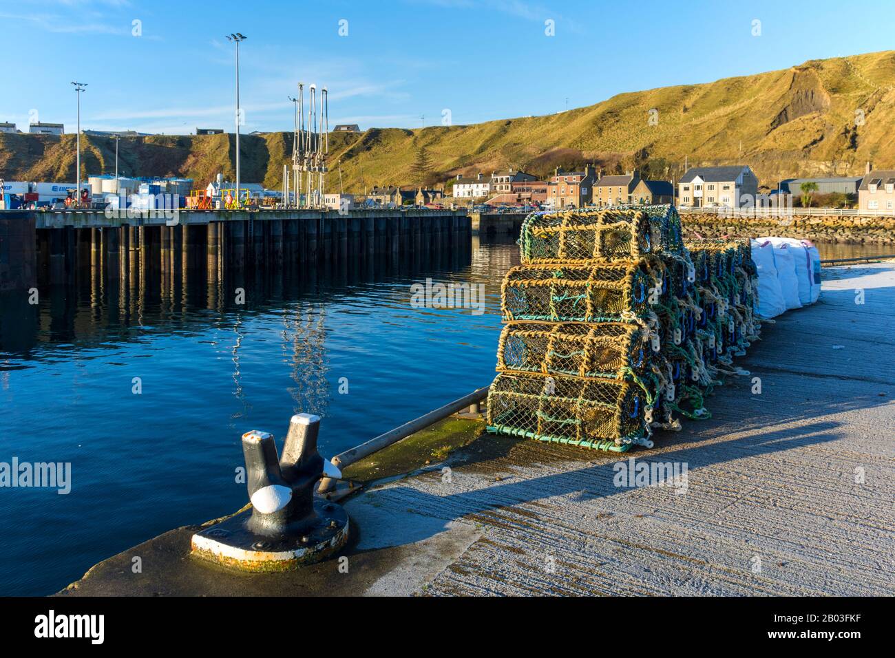 Fishing creels stacked at Scrabster harbour, near Thurso, Caithness, Scotland, UK Stock Photo