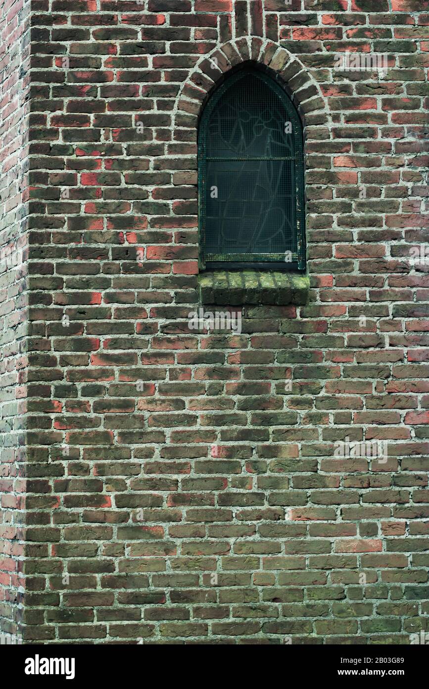 Window in brick wall of church Stock Photo - Alamy