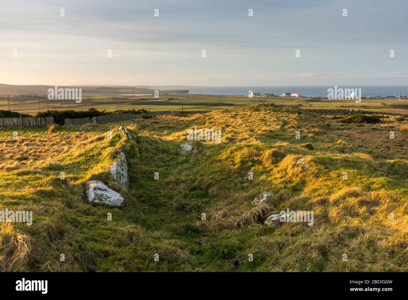 The Dounreay nuclear establishment from the Cnoc Freicedain chambered cairns on the Hill of Shebster.  Near Thurso, Caithness, Scotland, UK. Stock Photo