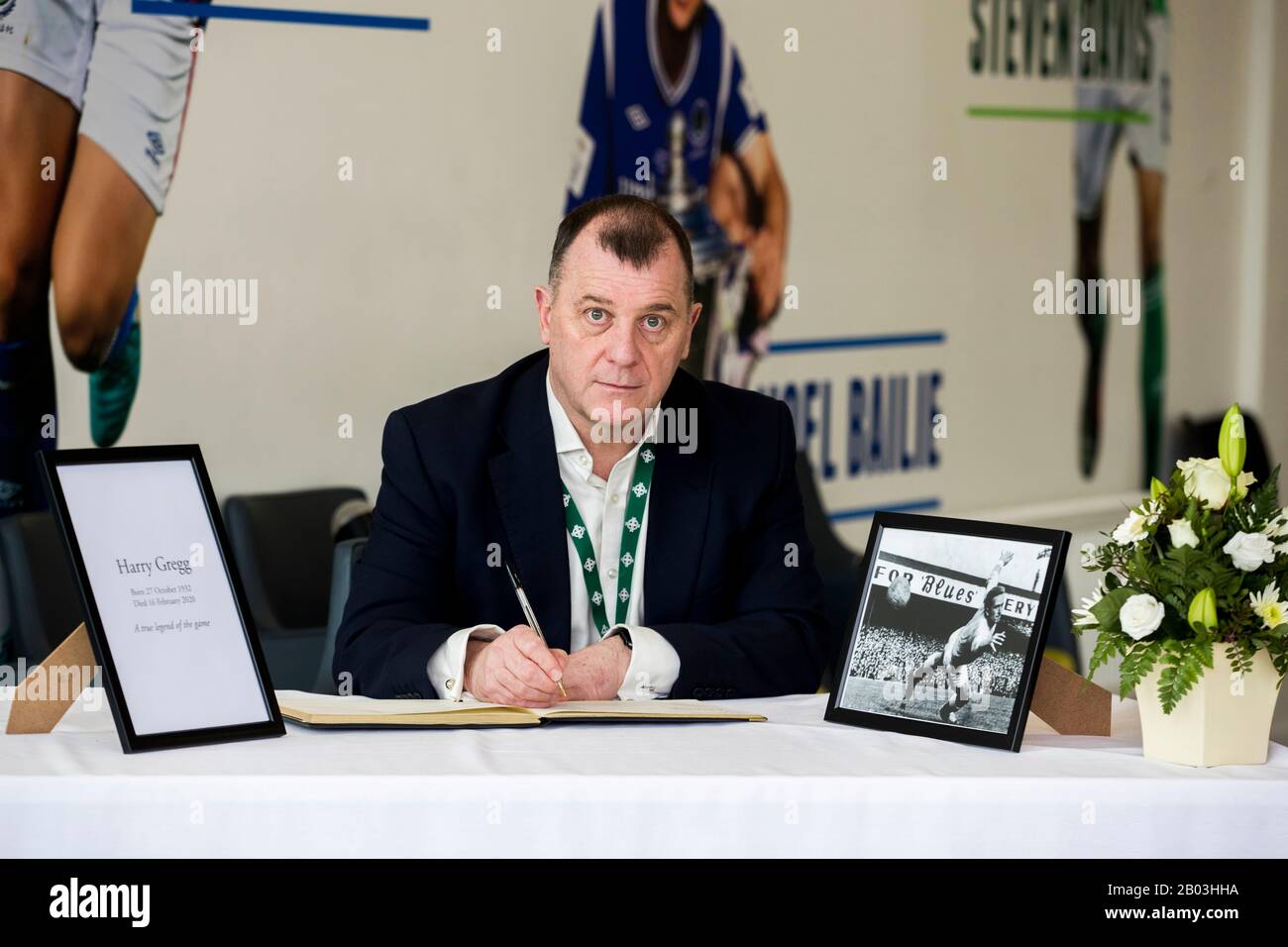 Patrick Nelson, Chief Executive of the IFA, signs the book of ...
