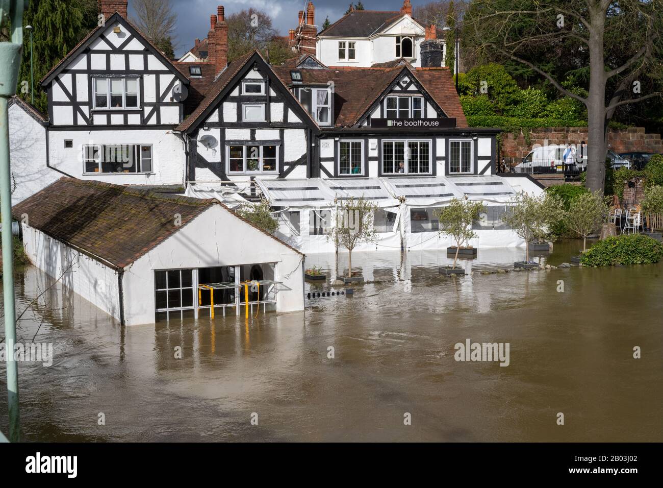 Flooding of the River Severn in Shrewsbury, UK. Flooding The Boathouse Pub. Stock Photo