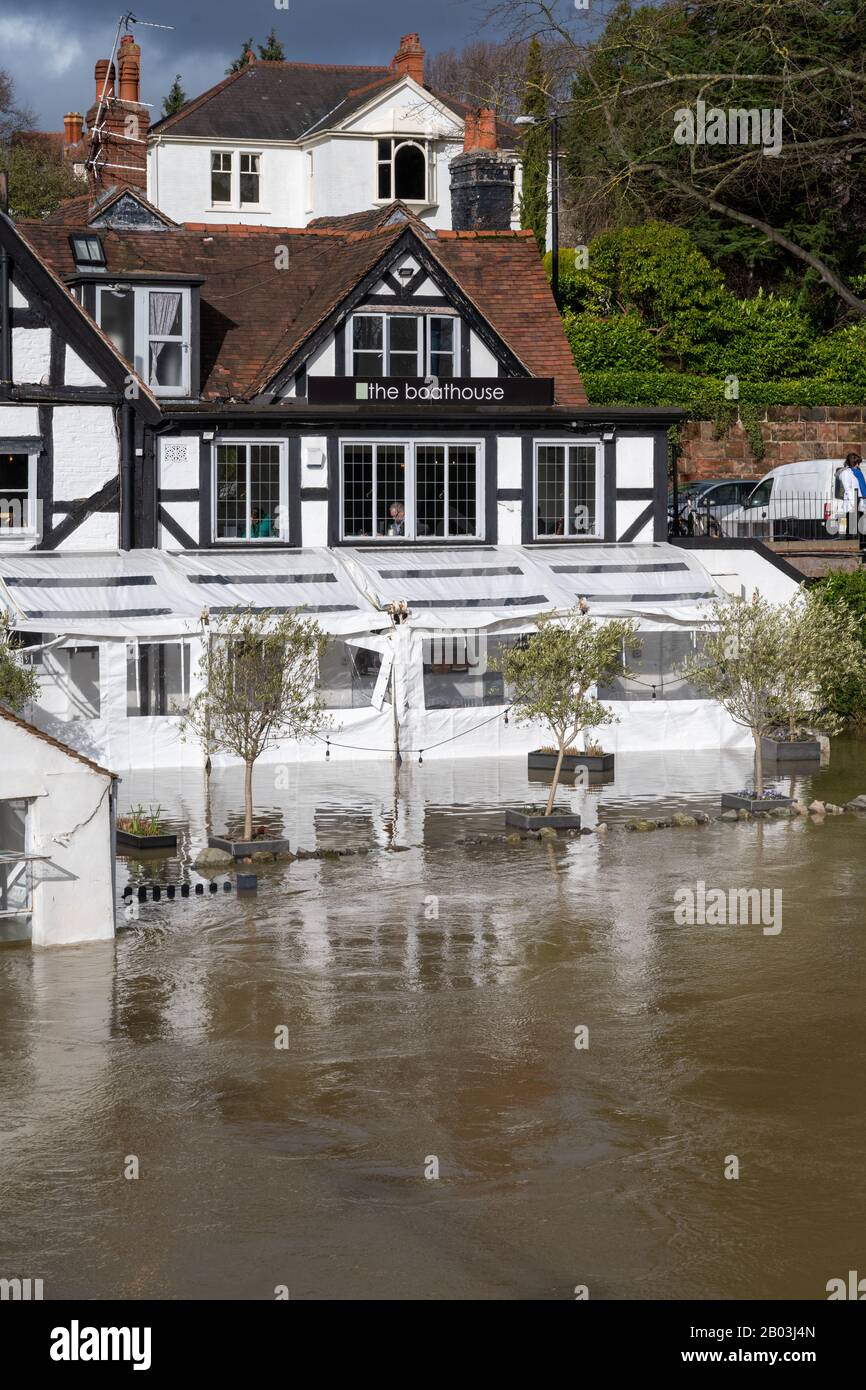 Flooding of the River Severn in Shrewsbury, UK. Flooding The Boathouse Pub. Stock Photo