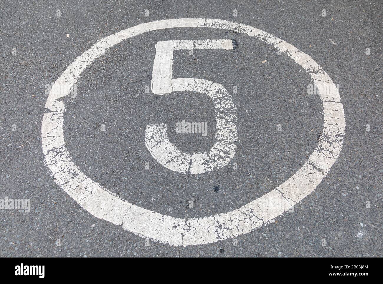 speed limit painted on road in white paint in Wallasey Merseyside July 2019 Stock Photo