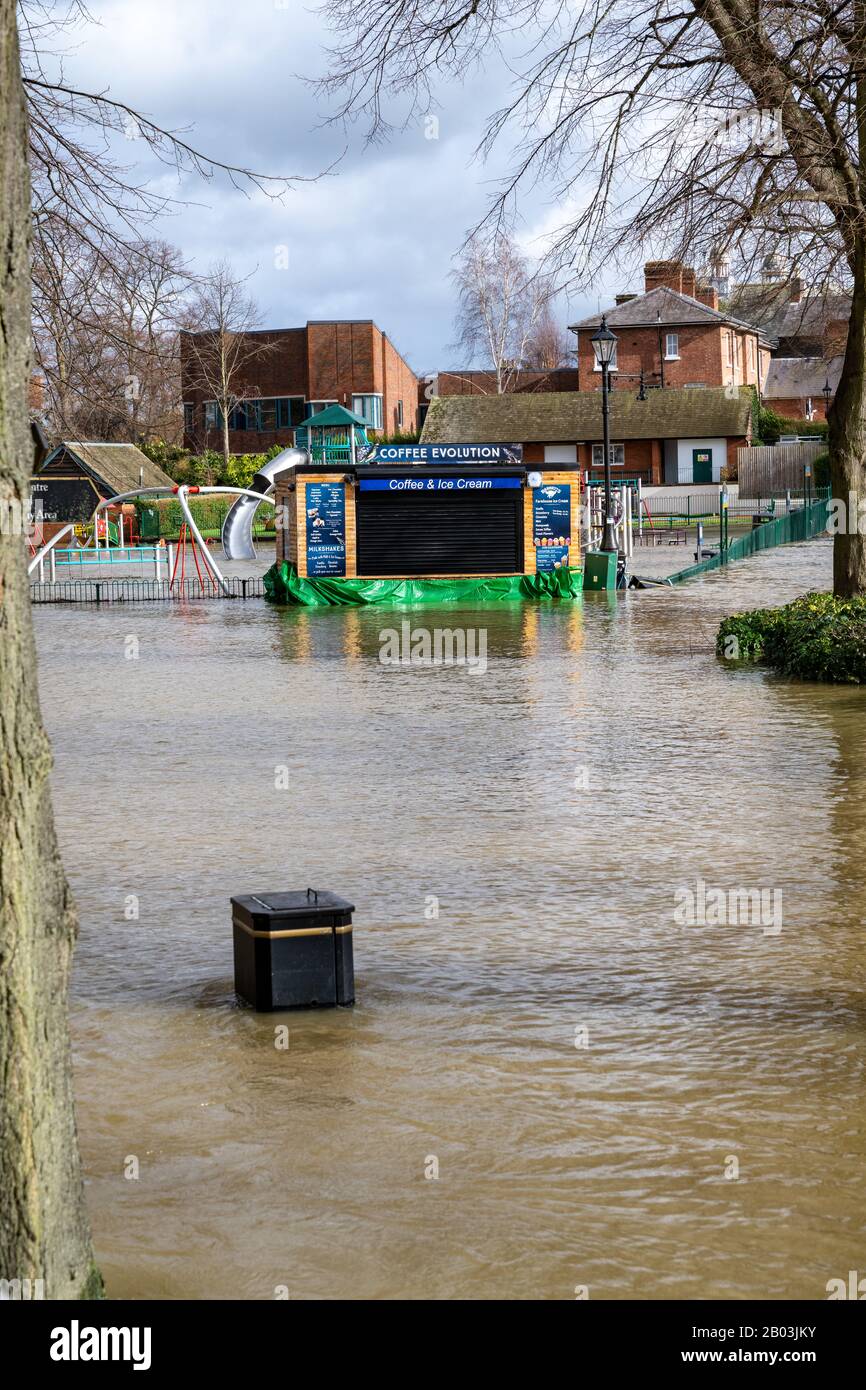Flooding of the River Severn in Shrewsbury, UK. Flooding the Quarry Park , a children's play area and The Boathouse Pub. Stock Photo