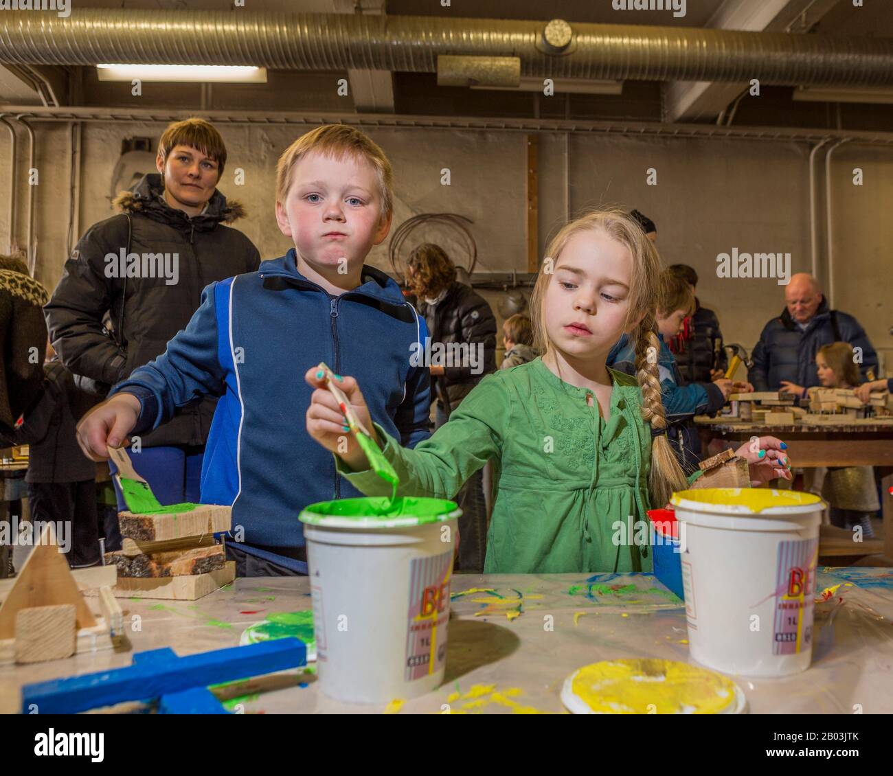 Siblings painting, children's festival, Reykjavik, Iceland Stock Photo