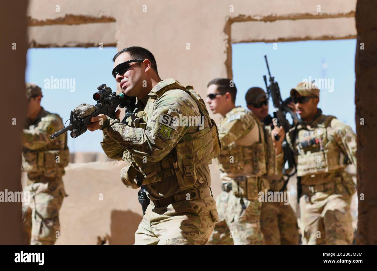 U.S. Air Force commandos with the 409th Expeditionary Security Forces Squadron Response Force, conduct building clearing procedures during a close quarters battle refresher course at Nigerian Air Base 201 February 5, 2020 in Agadez, Niger. Stock Photo
