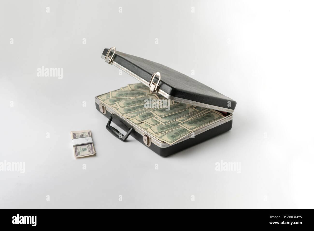 opened vintage case full of cash dollar money, hundred banknote on ...