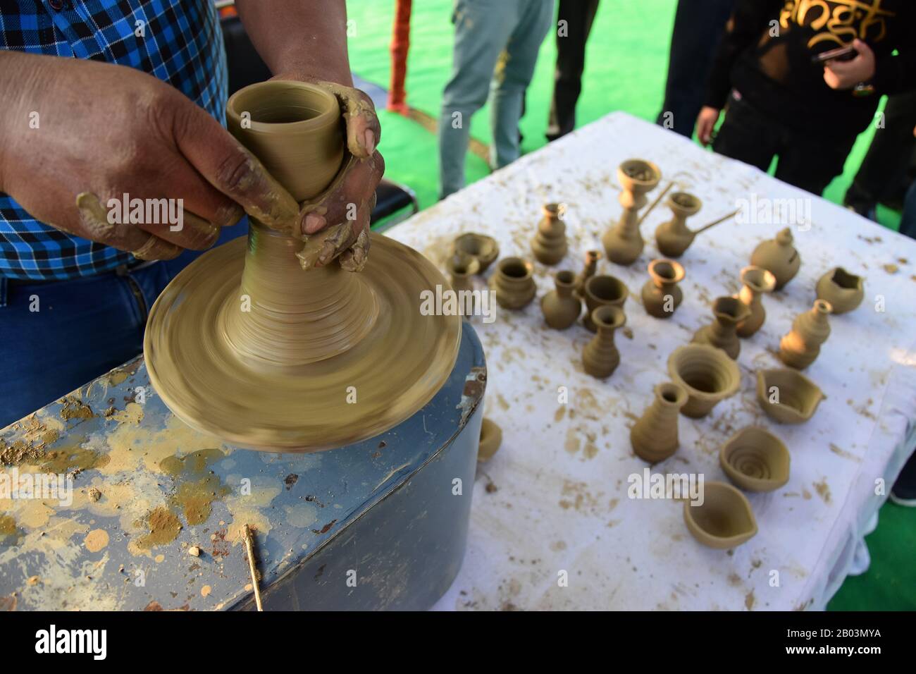 Delhi, India. 18th Feb, 2020. Traditional clay potters display their work at a stall during the festival.Hunar Haat festival at India Gate Lawns in Rajpath, is organised by the Union Ministry of Minority Affairs. The 10-day skills festival runs from 13-23 February with master artisans, craftsmen and culinary experts, including more than 50 per cent women, from across the country participating at the Haat. Credit: SOPA Images Limited/Alamy Live News Stock Photo