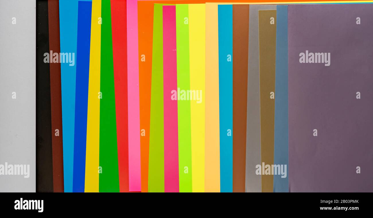 various sheets of color paper mix flat lay abstract background Stock ...