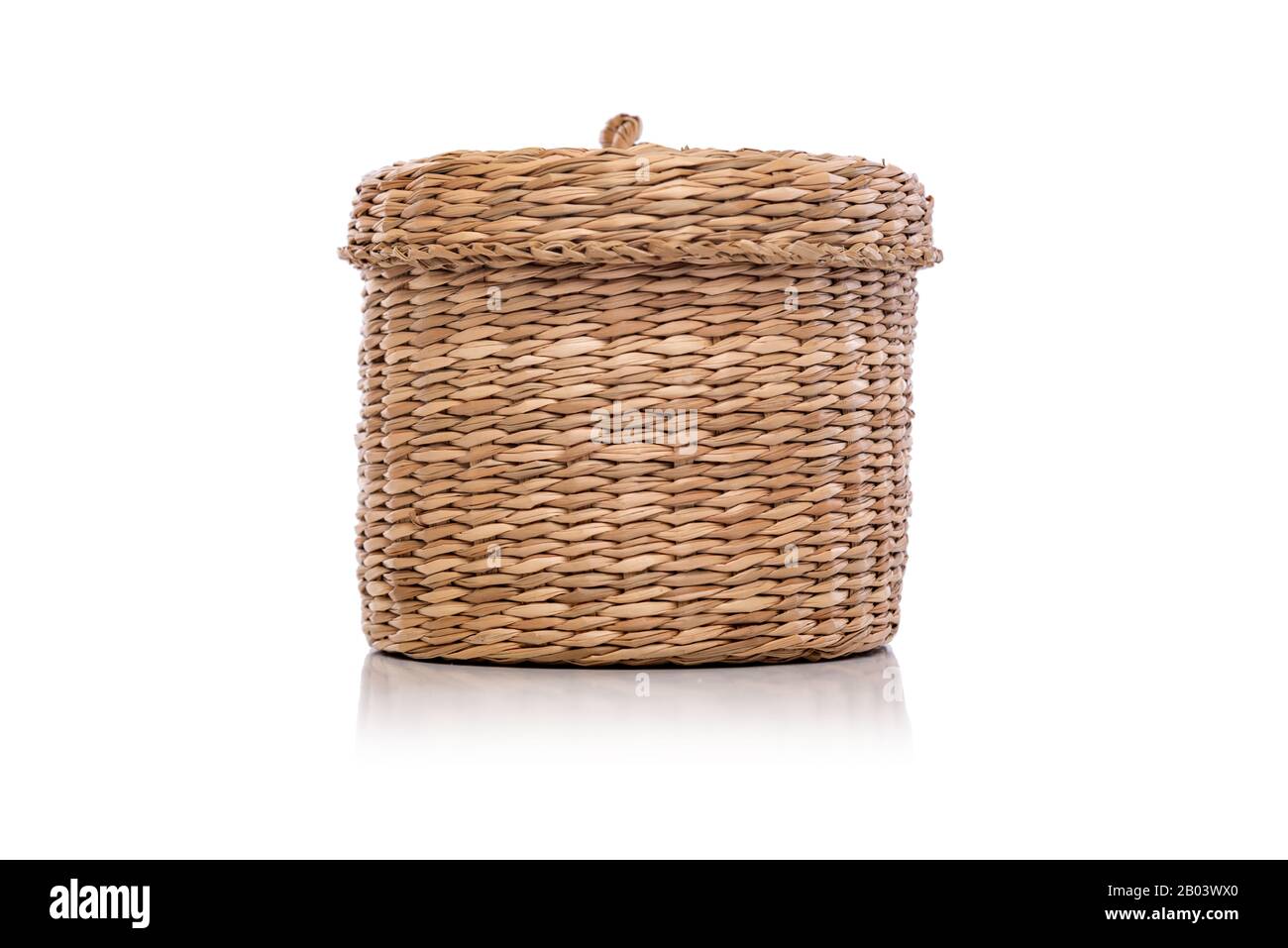 Wicker basket is isolated on a white background. Stock Photo