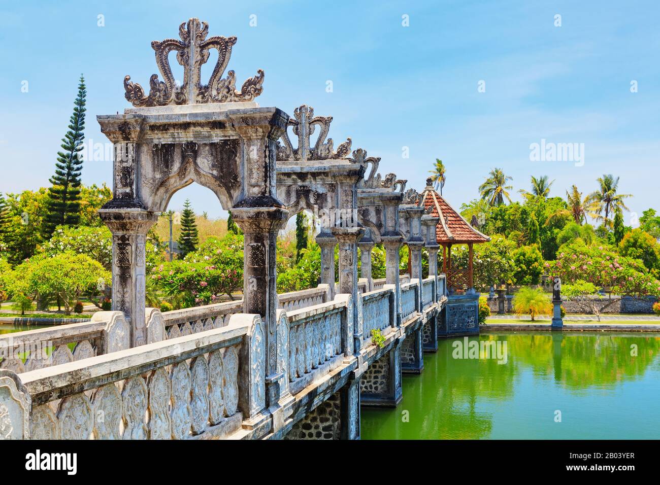 View of ancient bridge in Taman Ujung near Alampura in Karangasem on Bali  Island. Water Palace of Balinese royal family with water pools Stock Photo  - Alamy