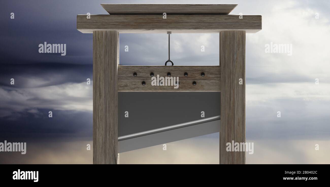 Guillotine, behead, decapitation instrument against cloudy sky background. Capital punishment, death penalty execution concept.  Closeup view, detail. Stock Photo