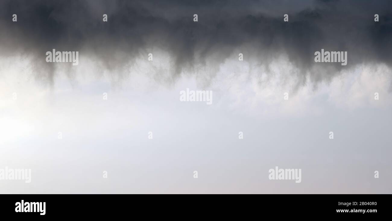 cloudscape background of stormy dark clouds with copy space Stock Photo ...