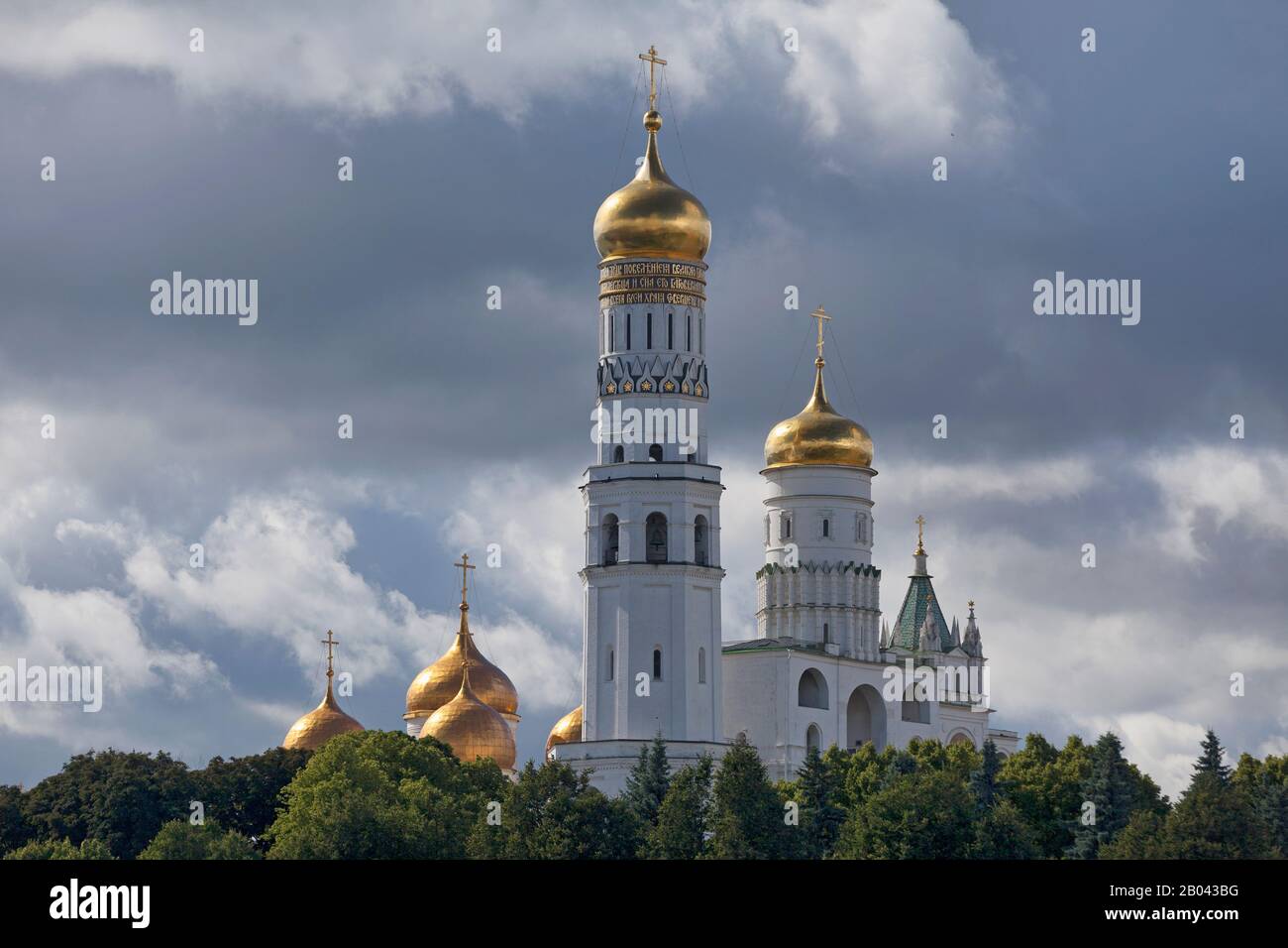 Moscow, Russia - July 07 2018: The Ivan the Great Bell-Tower and the onion domes of the Dormition Cathedral. Stock Photo