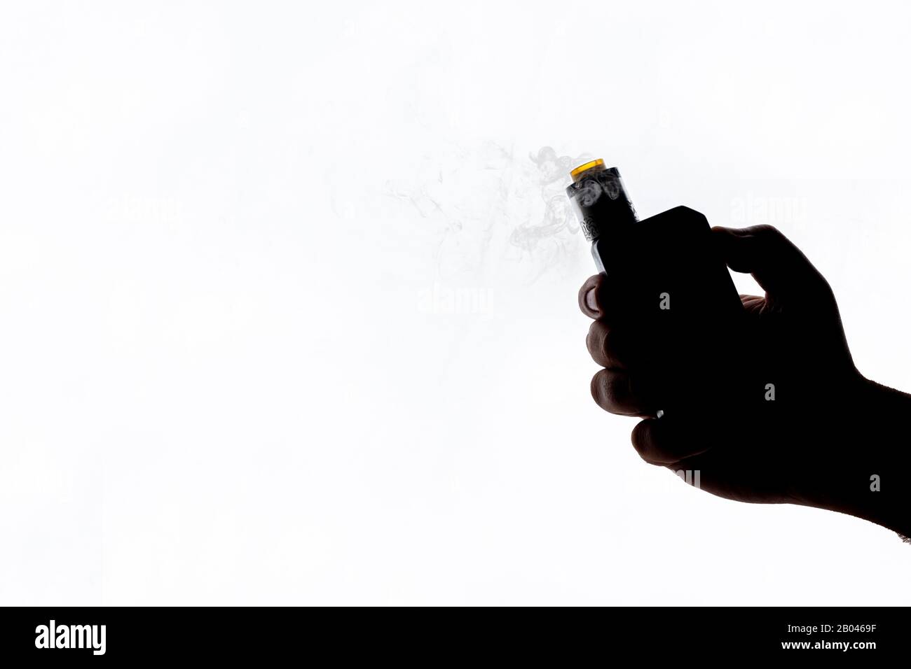 Vape mod e-cig for help quit smoking tobacco with rdta on white background silhouette shape close up Stock Photo