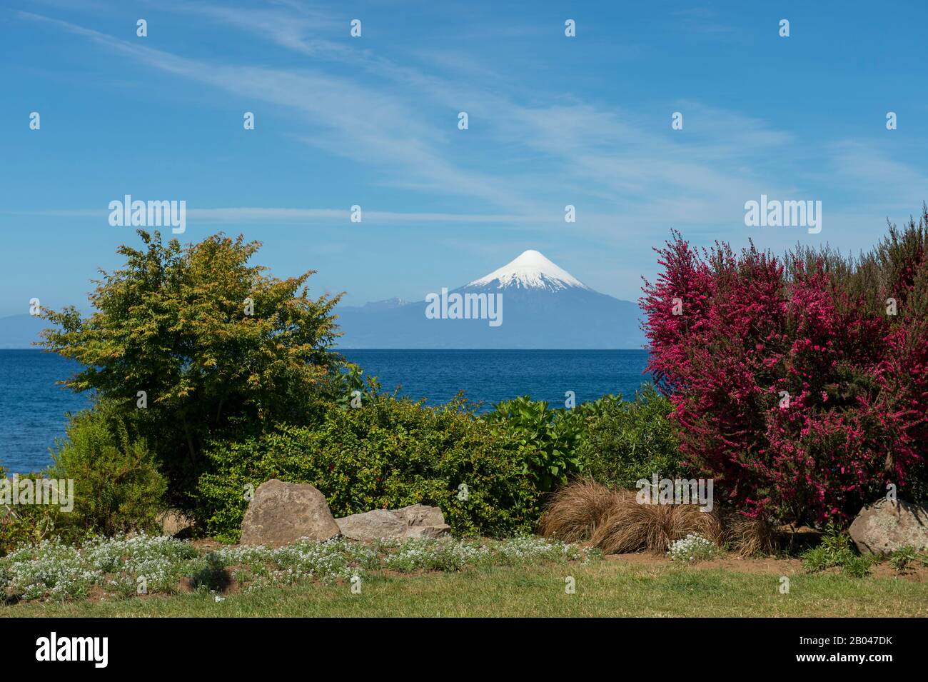 View of Lake Llanquihue with Osorno Volcano in background from Frutillar, a small town in the Lake District near Puerto Montt, Chile. Stock Photo