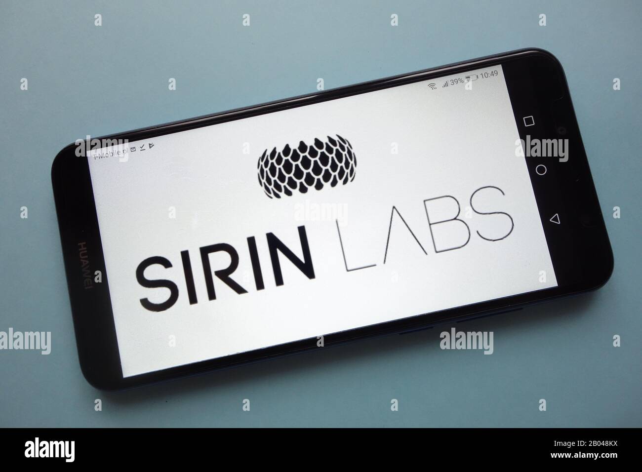 SIRIN LABS Token (SRN) cryptocurrency logo displayed on smartphone Stock Photo