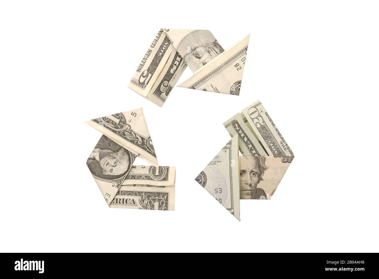 Recycling symbol formed into an origami cash flow of US dollar bank notes, one to five to twenty and back Stock Photo