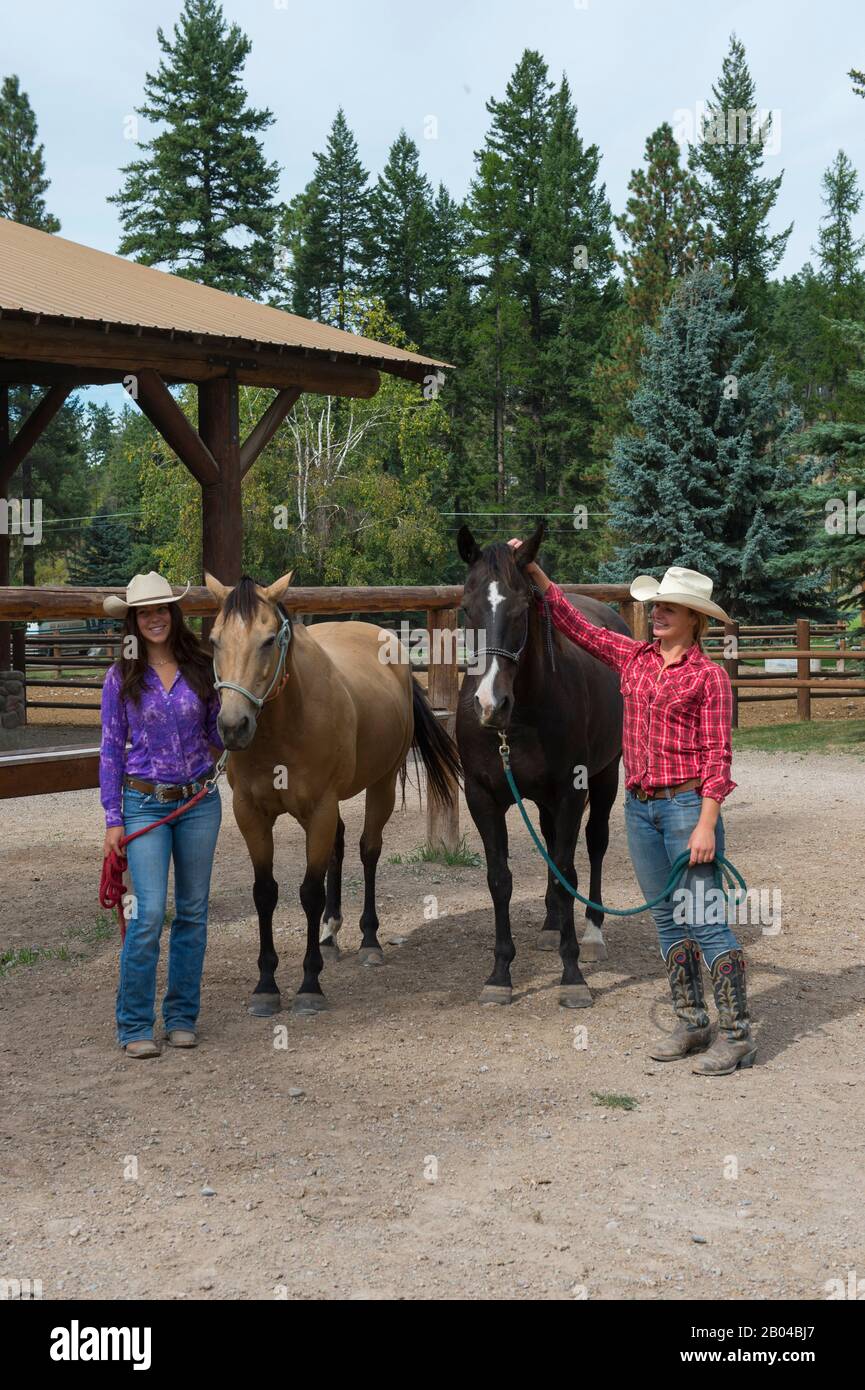 Cowgirls (Wranglers) with their horses at Averill's Flathead Lake Lodge